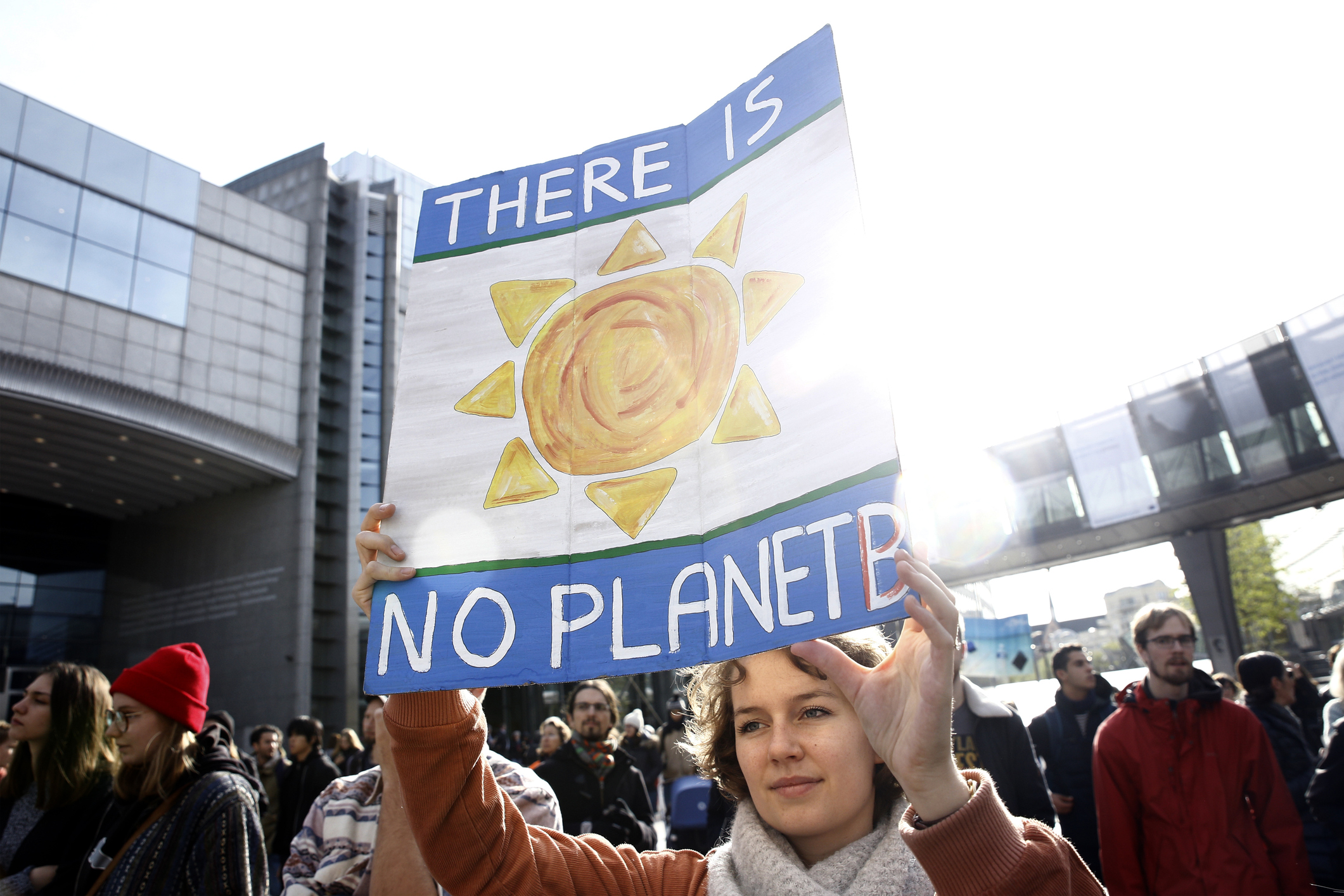 Brussels, Belgium. 3rd Nov. 2018.Activists hold placards and chant slogans during a demonstration to demand immediate an action on climate change in front of European Parliament.