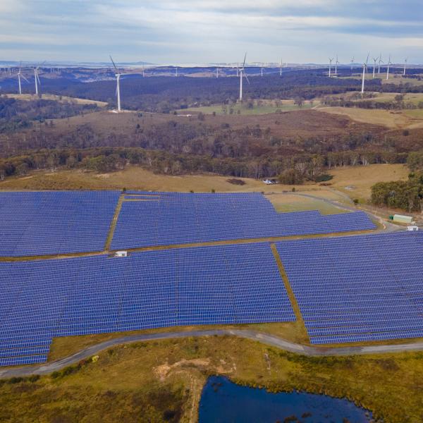 Aerial drone view of the hybrid Gullen Solar Farm and Gullen Range Wind Farm for renewable clean energy supply located at Bannister in NSW stock photo