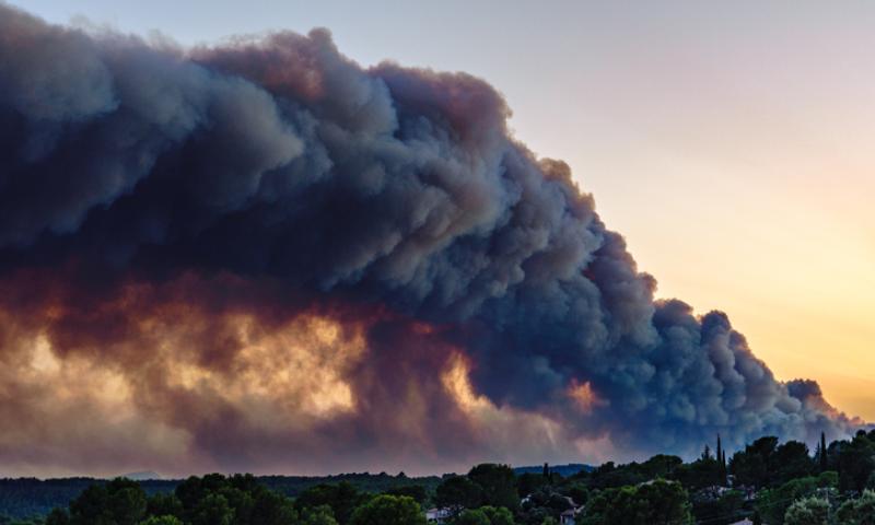 A view from the village of Flayosc (Var), France with forest fire smoke